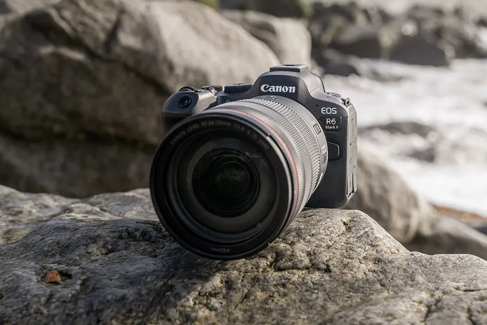 Best hybrid camera for photo and video showing a full-frame mirrorless model on a tripod