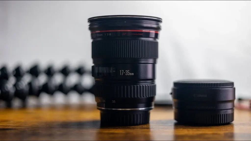 Food photographer using a 50mm food photography lens during a studio shoot