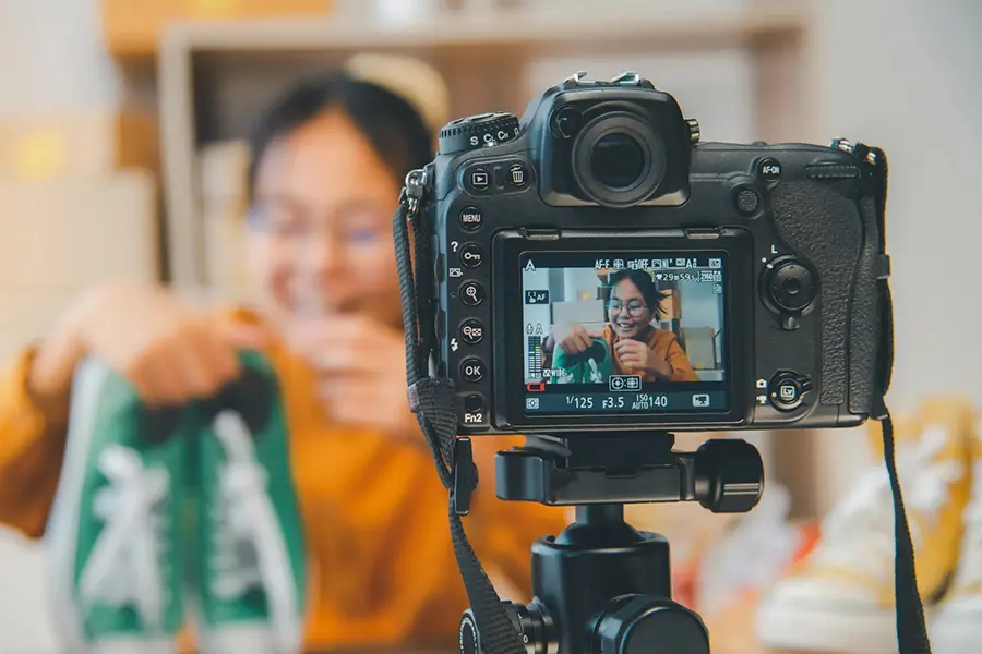 Creator testing the best camera for influencers while filming beauty content indoors