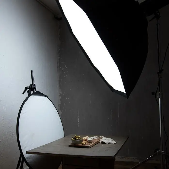 Creative food photography lighting setup featuring soft, even illumination and controlled highlights