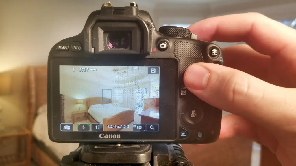 Exterior shot of luxury property with DSLR and camera setting for real estate photography, capturing bright windows and sharp architectural lines