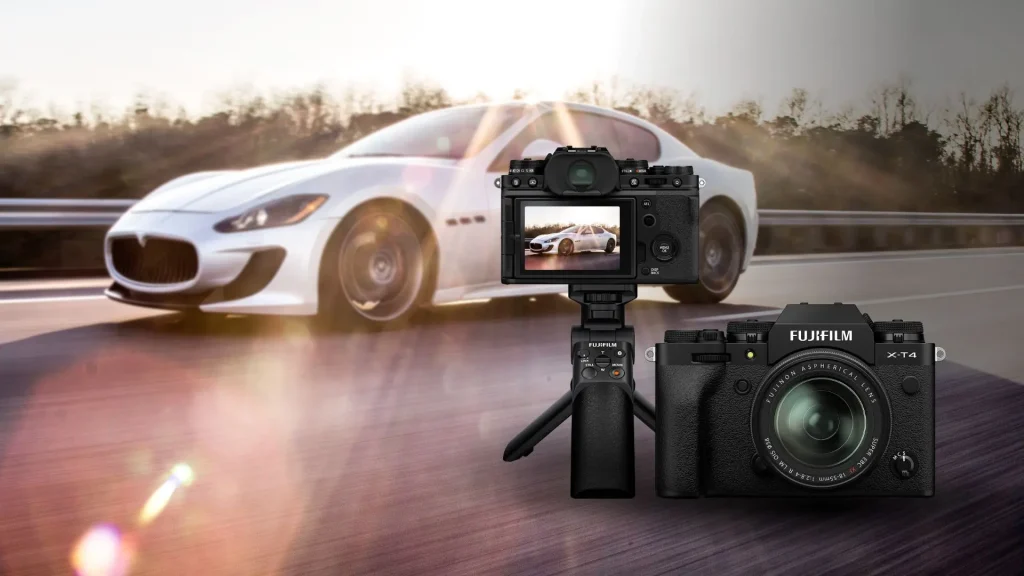 best camera for car photography capturing a luxury sports car in Dubai at sunset