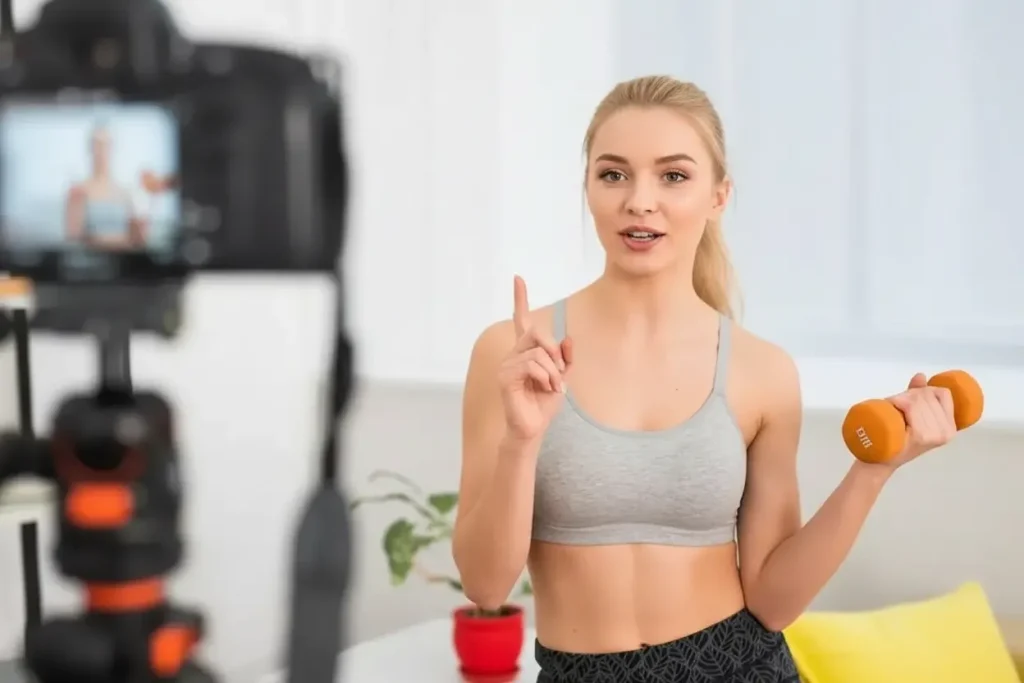 best camera for fitness influencers filming workouts in a gym with professional lighting