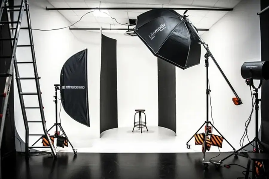 Photography studio equipment names showing camera, lenses, tripods, and modifiers