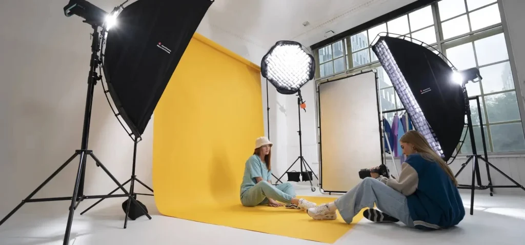Studio backdrop setup with seamless background, stable stand, and controlled lighting for professional photography